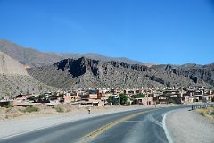 07 Driving By Tilcara Old Town On Highway 9 From Purmamarca To Tilcara In Quebrada De Humahuaca.jpg